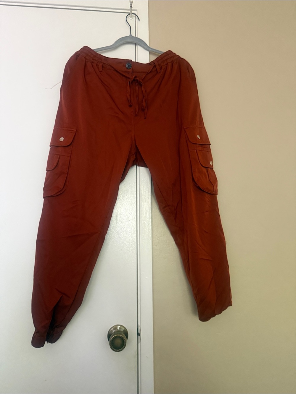 Clothing Brand Religion. Women's Cargo Joggers in Rust Red/Orange silk material